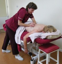 Julie Nicholls treating back pain with remedial massage